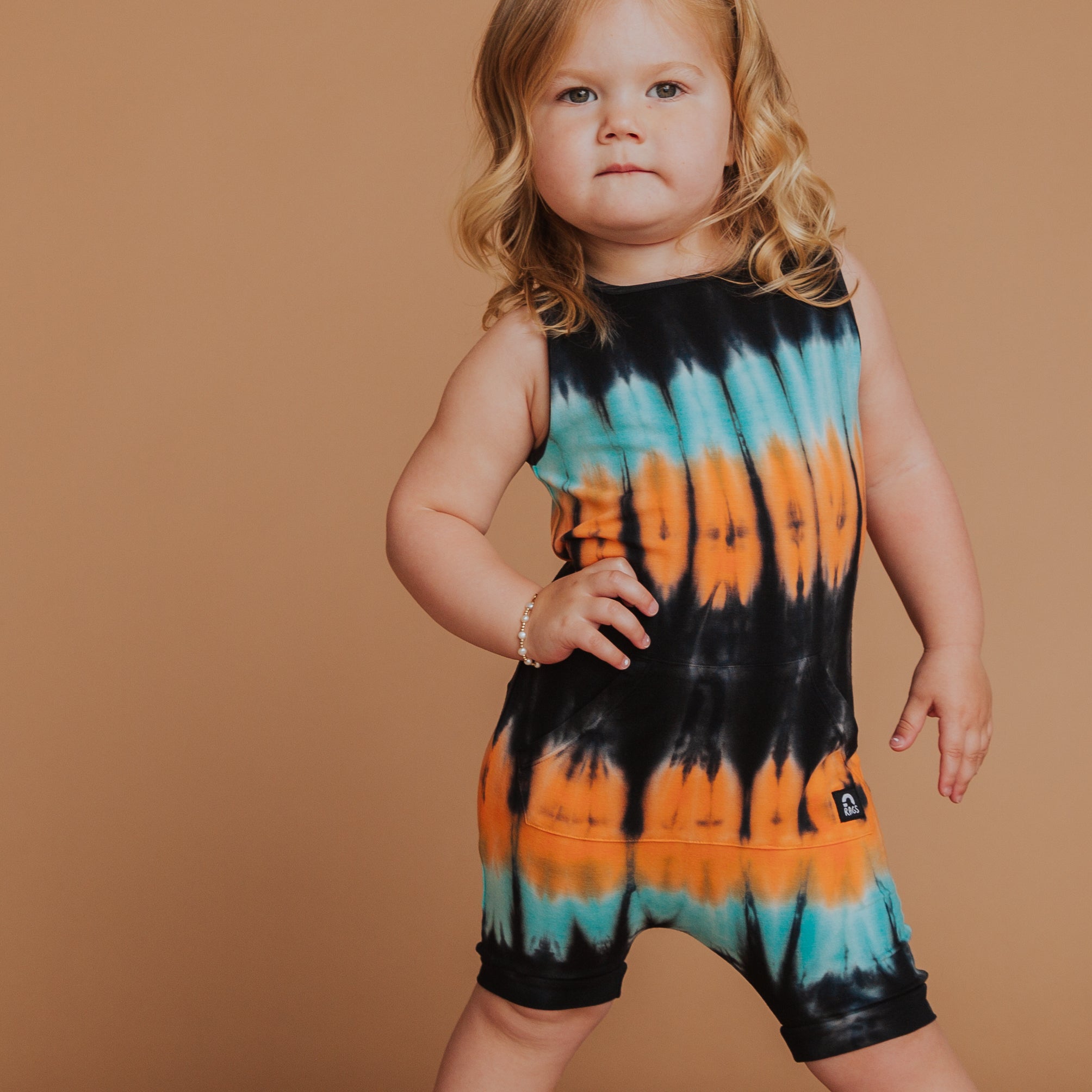 Rags 3/4T pink tie dye deals rainbow romper NWT